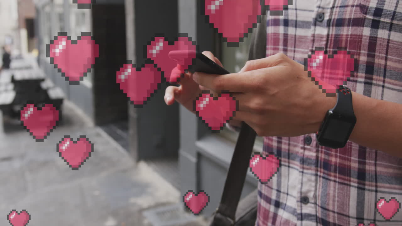 animación de iconos de corazón flotando sobre el hombre usando un teléfono inteligente