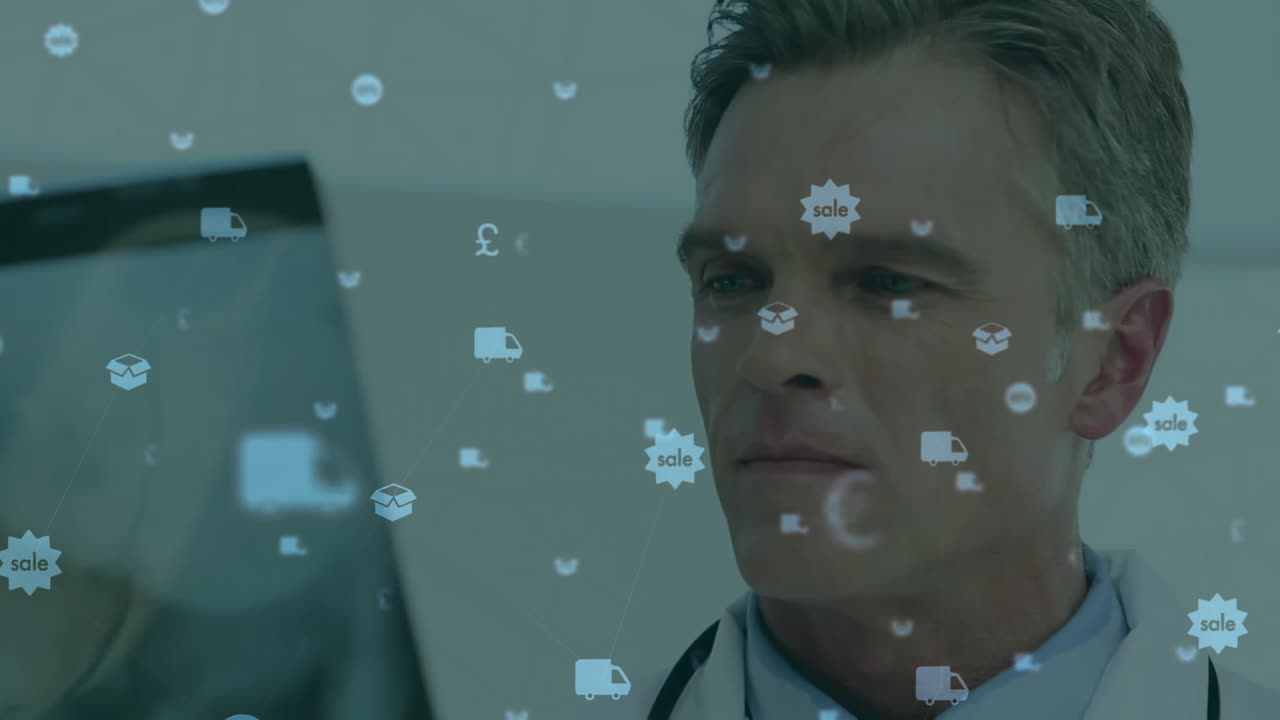 animación de las finanzas y los iconos minoristas sobre el médico caucásico masculino sosteniendo rayos x