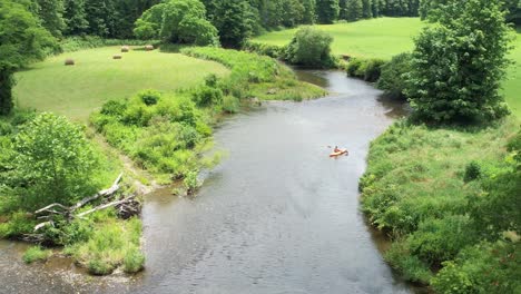 the new river in watauga county north carolina, nc, aerial push in through the hay fields