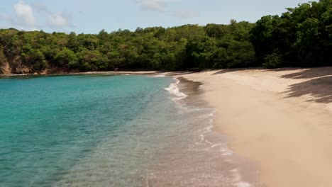 aerial of anse la roche beach in carriacou