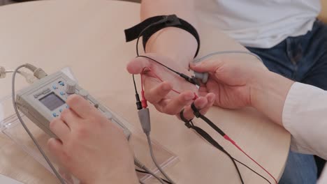 patient nerves testing using electromyography at medical center