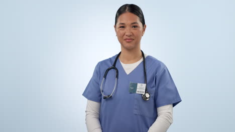 Woman,-face-and-nurse-smile-in-studio-with-arms