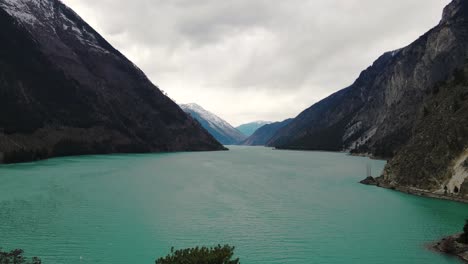 Reverse-aerial-shot-of-Seton-Lake-near-Lillooet-in-British-Columbia,-Canada