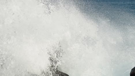 beautiful slow motion slo mo ocean waves crashing and breaking off the sea shore in hawaii