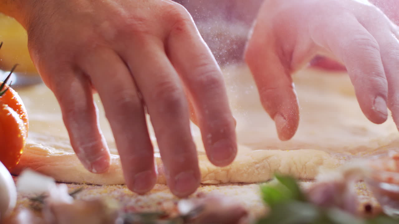 haciendo masa de pizza