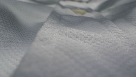 closeup of an expertly tailored suit that beautifully showcases its sophisticated buttons and fine fabric texture
