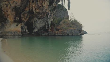 Hanging-Stalactites-Of-Side-Of-Limestone-Cliff-Beside-Railay-Beach-In-Thailand