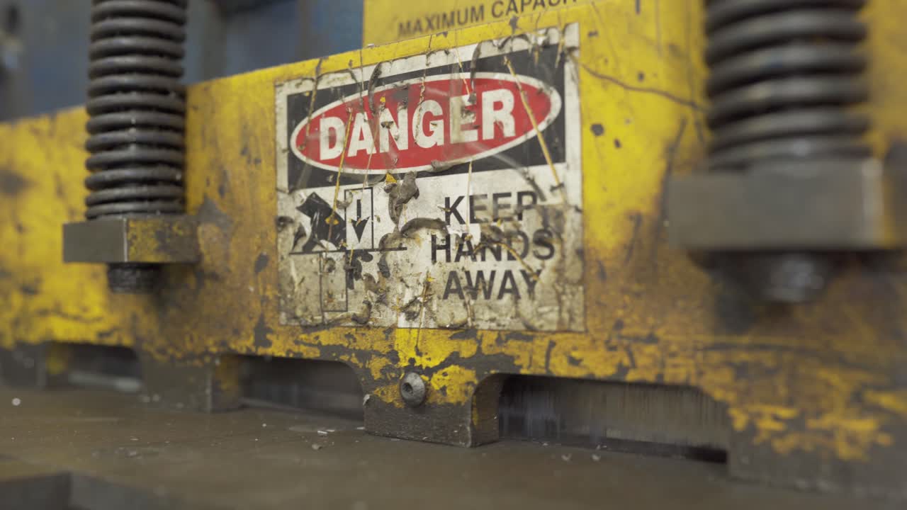 Metal Sheer Operating In A Industrial Metal Manufacturing Plant