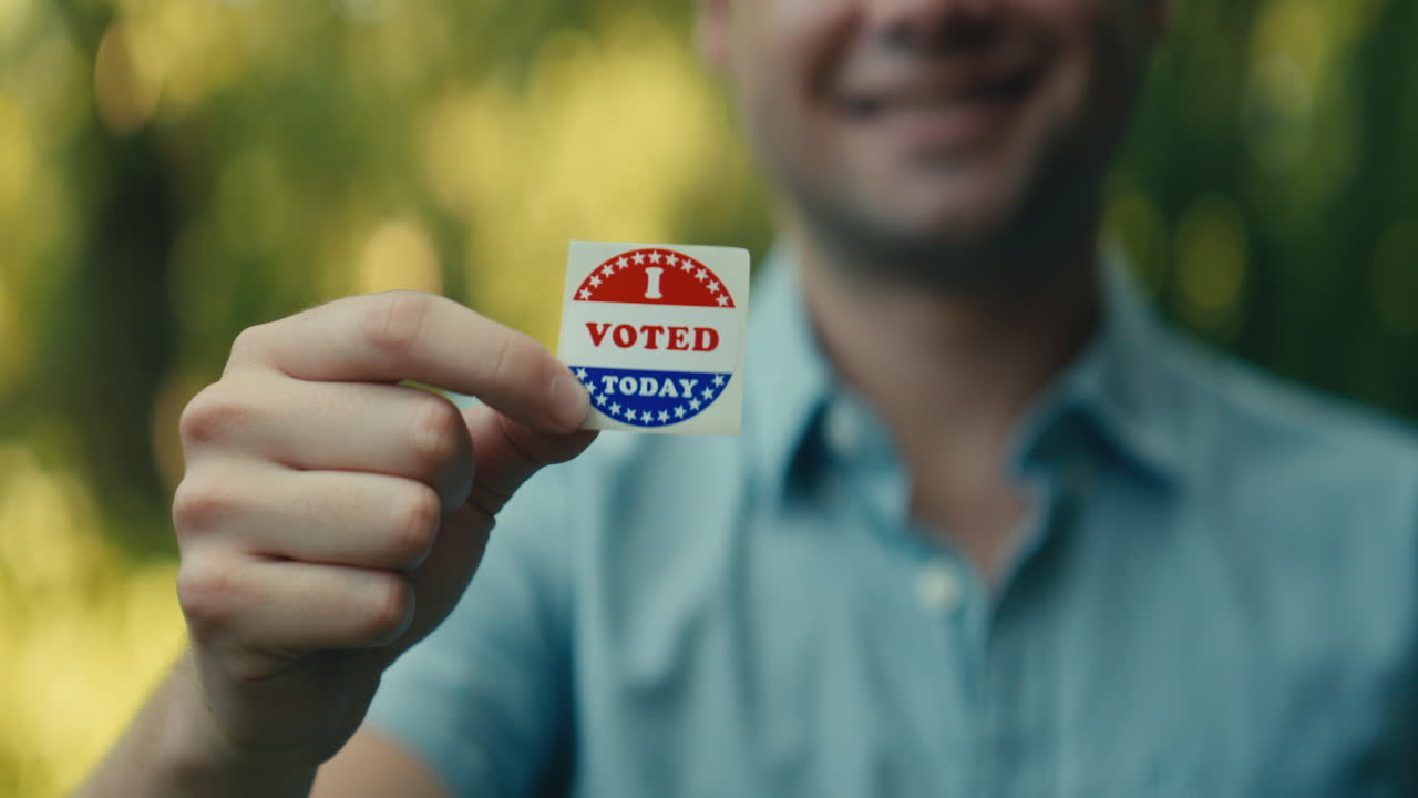 Man Holding I Voted Today Sticker
