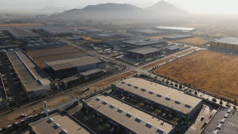 aerial shot of warehouses in industrial zone