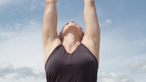 close up of attractive woman starting yoga exercise