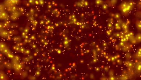 movimiento abstracto fondo rojo brillantes partículas de oro y estrellas. brillantes partículas brillantes con bokeh.