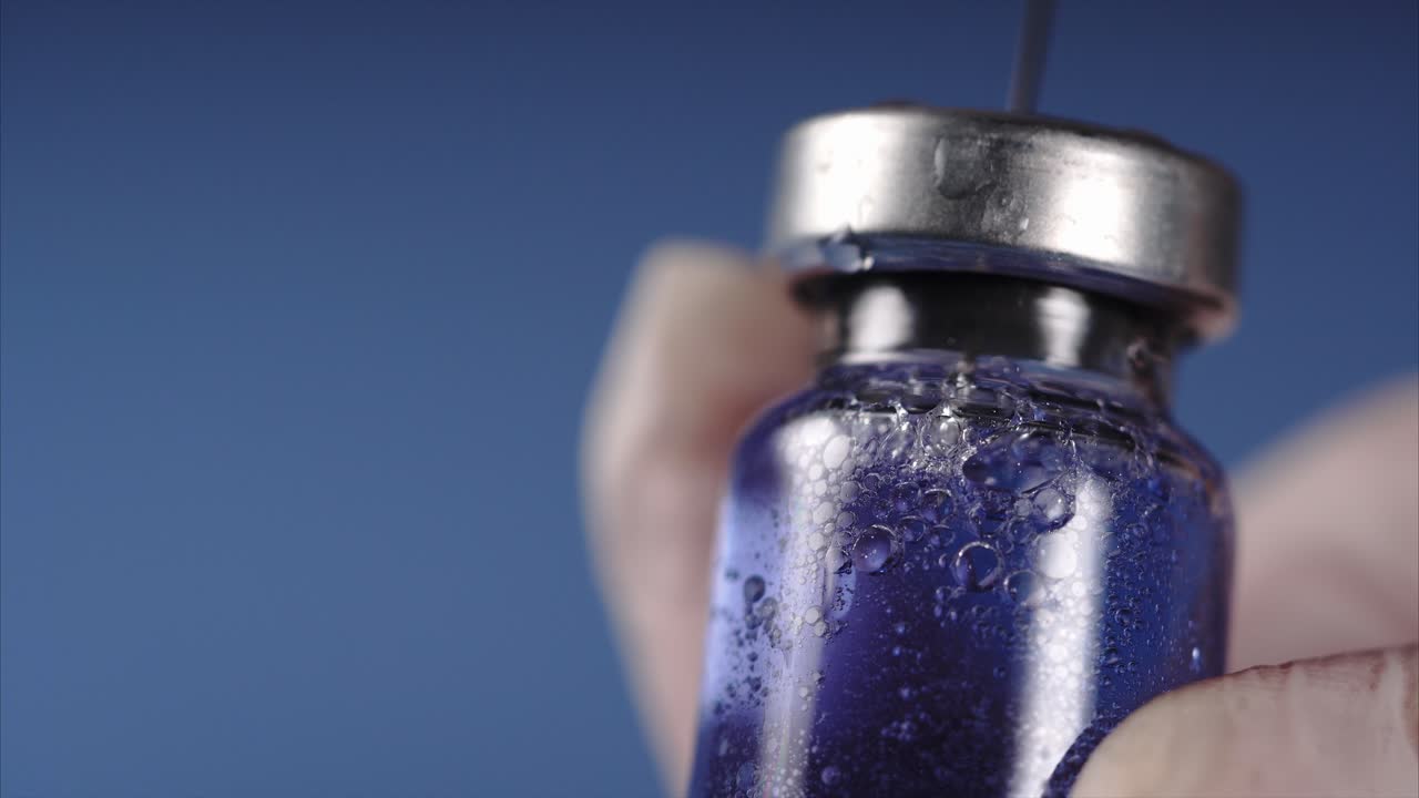 Vial of Vaccine with Syringe