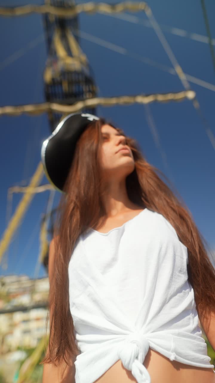 Young Woman in Pirate Hat by Ship