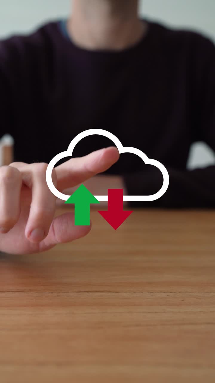 Man Taps The Cloud Icon With Upward And Downward Arrows - Cloud Storage And Data Transfer Concept. - vertical shot