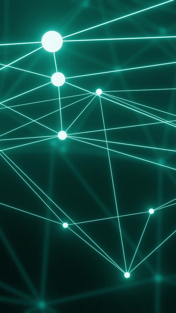 Vertical video: Cam panning visualizing teal node network shifting big node growing links reflowing