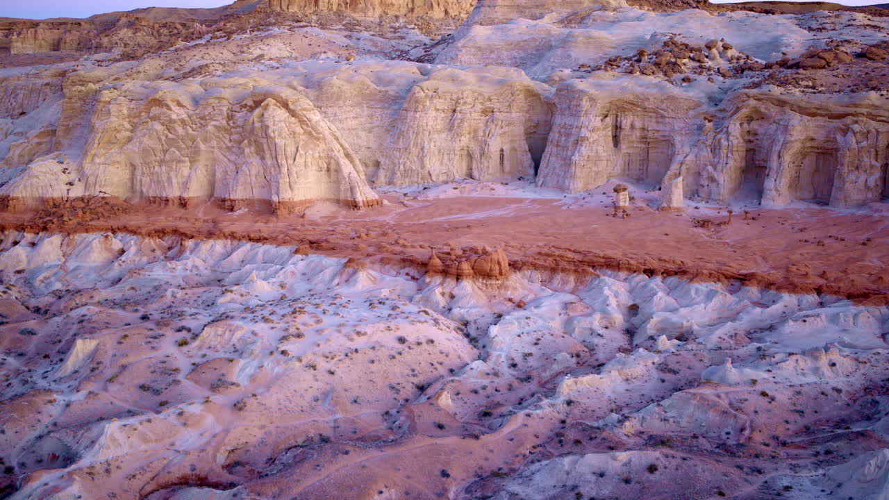 An overhead drone shot captures the kaleidoscopic beauty of the Southwestern landscape.