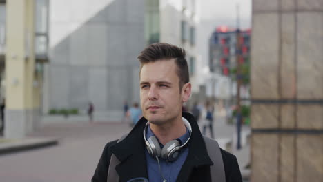 portrait attractive young businessman drinking coffee in city relaxed male commuter sipping beverage enjoying successful urban lifestyle