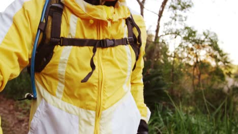 male mountain biker wearing backpack