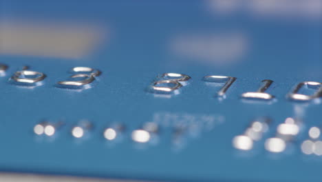 macro slider shot of a credit cards numbers