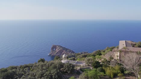 wide shot of mirador de sa foradada during day time at mallorca island, aerial