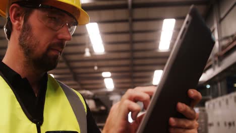 worker using digital tablet