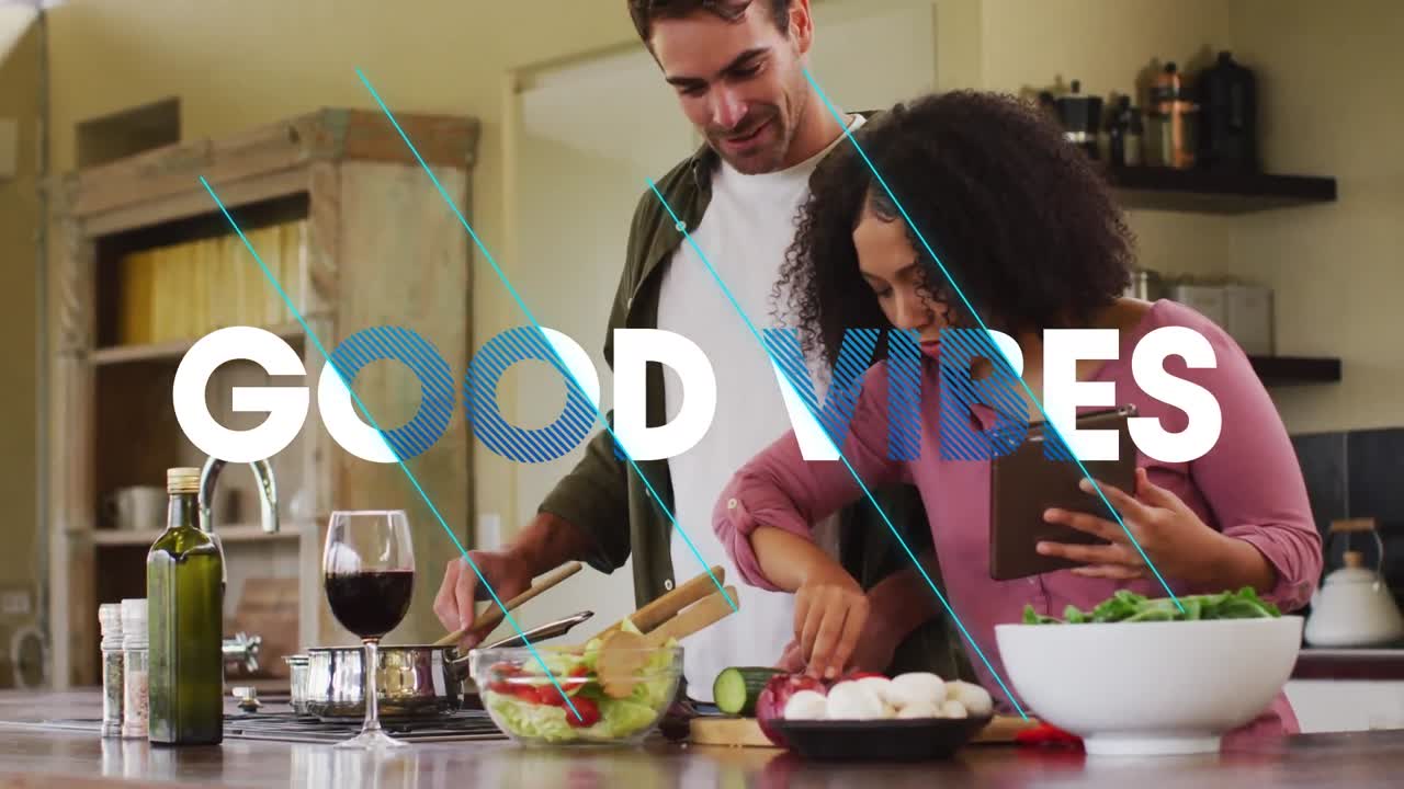 Animation of good vibes text over smiling diverse couple preparing food