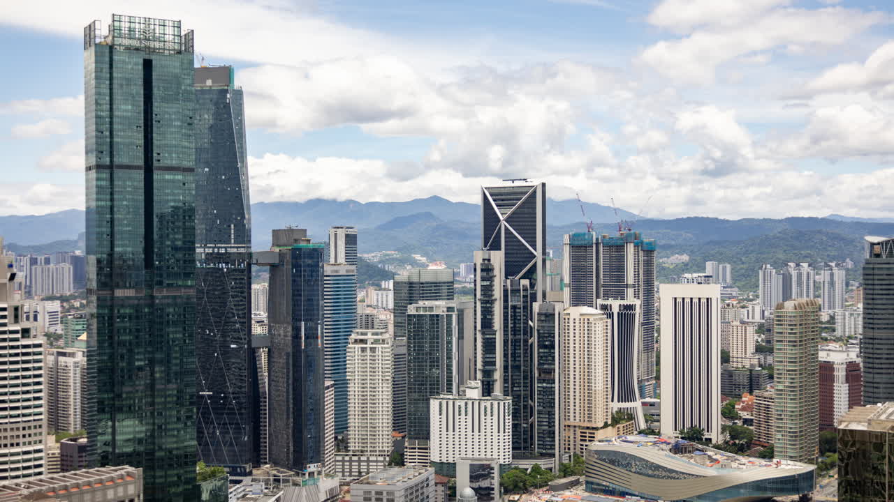 KUALA LUMPUR - 29 MARCH 2025 : Timelapse of the Kuala Lumpur skyline from a high vantage point