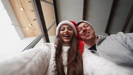 couple opening a christmas gift