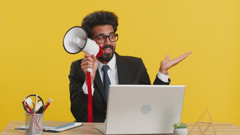 Businessman-talking-with-megaphone,-proclaiming-news,-announcing-advertisement-pointing-empty-place