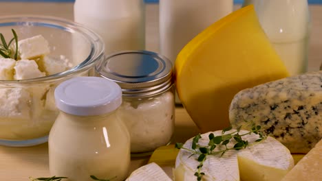 various dairy items arranged on a wooden board