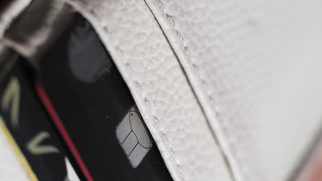 closeup of credit cards in a white wallet