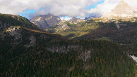 Idyllic-South-Tyrol-woodland-landscape-with-panoramic-Tre-Cime-majestic-mountain-range-on-the-horizon