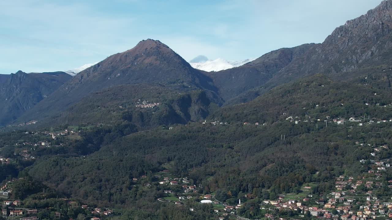Stunning aerial view of the Italian Alps showcasing lush valleys and peaks