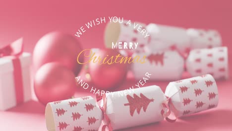 Animation-of-christmas-greetings-text-over-christmas-crackers-and-decorations