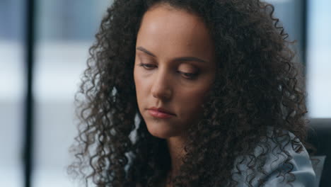 unhappy latin woman disappointed work results closeup. tired boss thinking alone