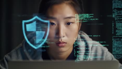 focused on cybersecurity: a young woman engaged in computer work surrounded by digital data and security icons, highlighting modern challenges in technology