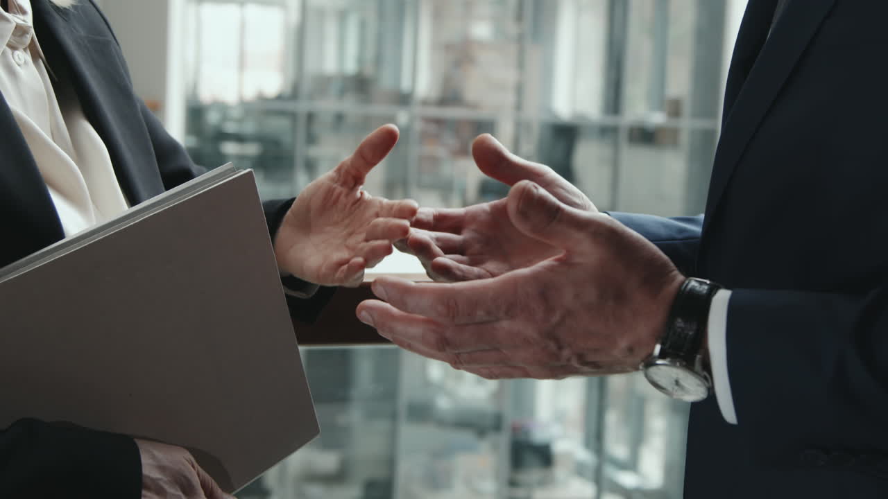 Hands of Business People Gesticulating during Conversation