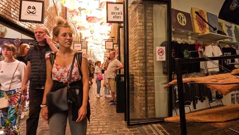 shoppers explore vibrant camden market in london