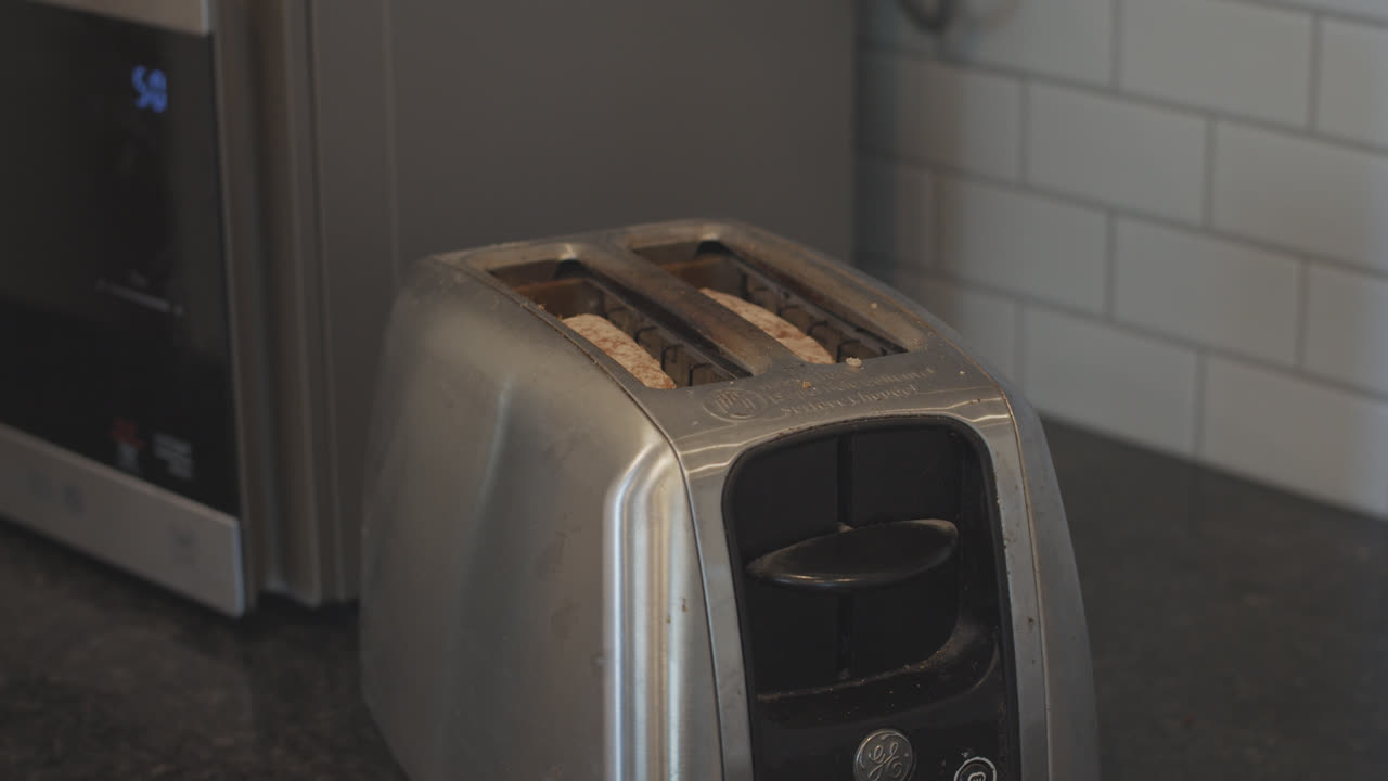 Toast pops up in the toaster