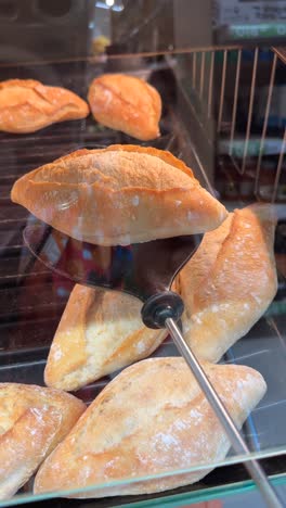 freshly baked bread rolls on display