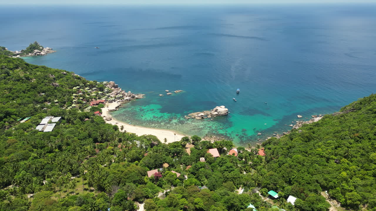 Overview Of Tanote Bay With Coral Reef Under Clear Shallow Sea On Koh Tao Island In Thailand