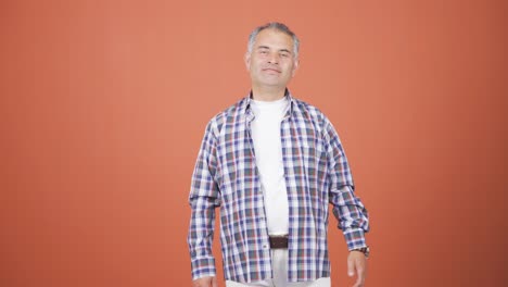 Man-smiling-at-camera