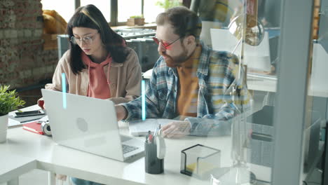 two colleagues collaborating in the office