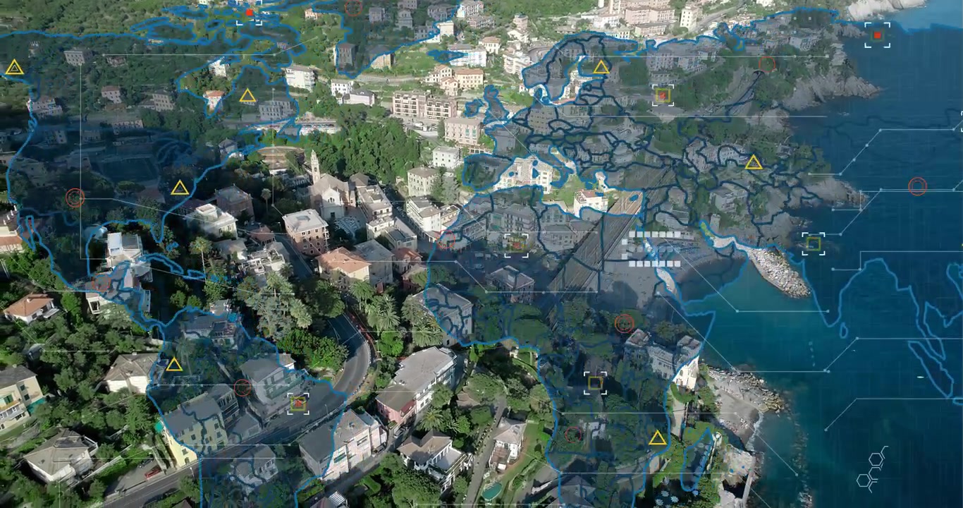 Starting with aerial sweep, Mediterranean town revealing digital overlays for geospatial analysis