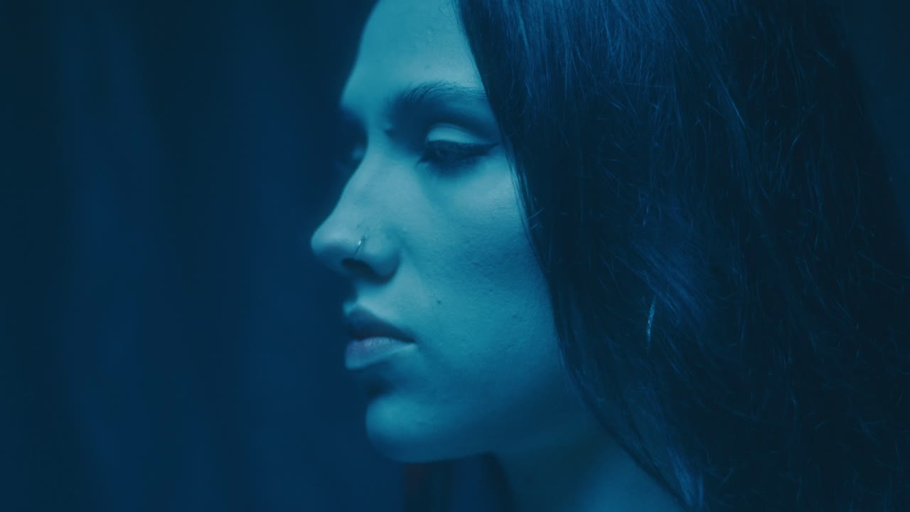 Woman in Neon Light Profile Portrait