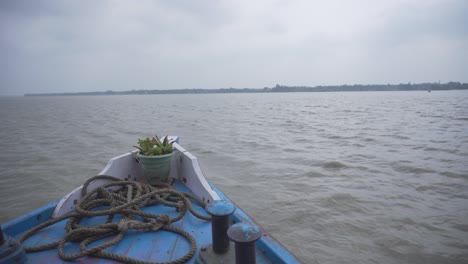 a boat is sailing on the ganges river.