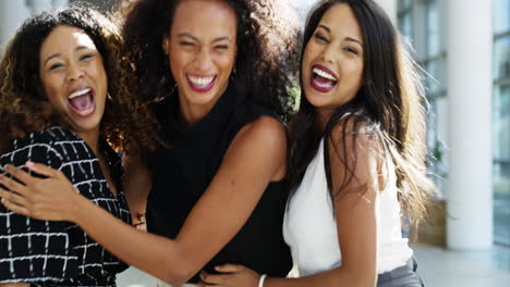 three happy women celebrating