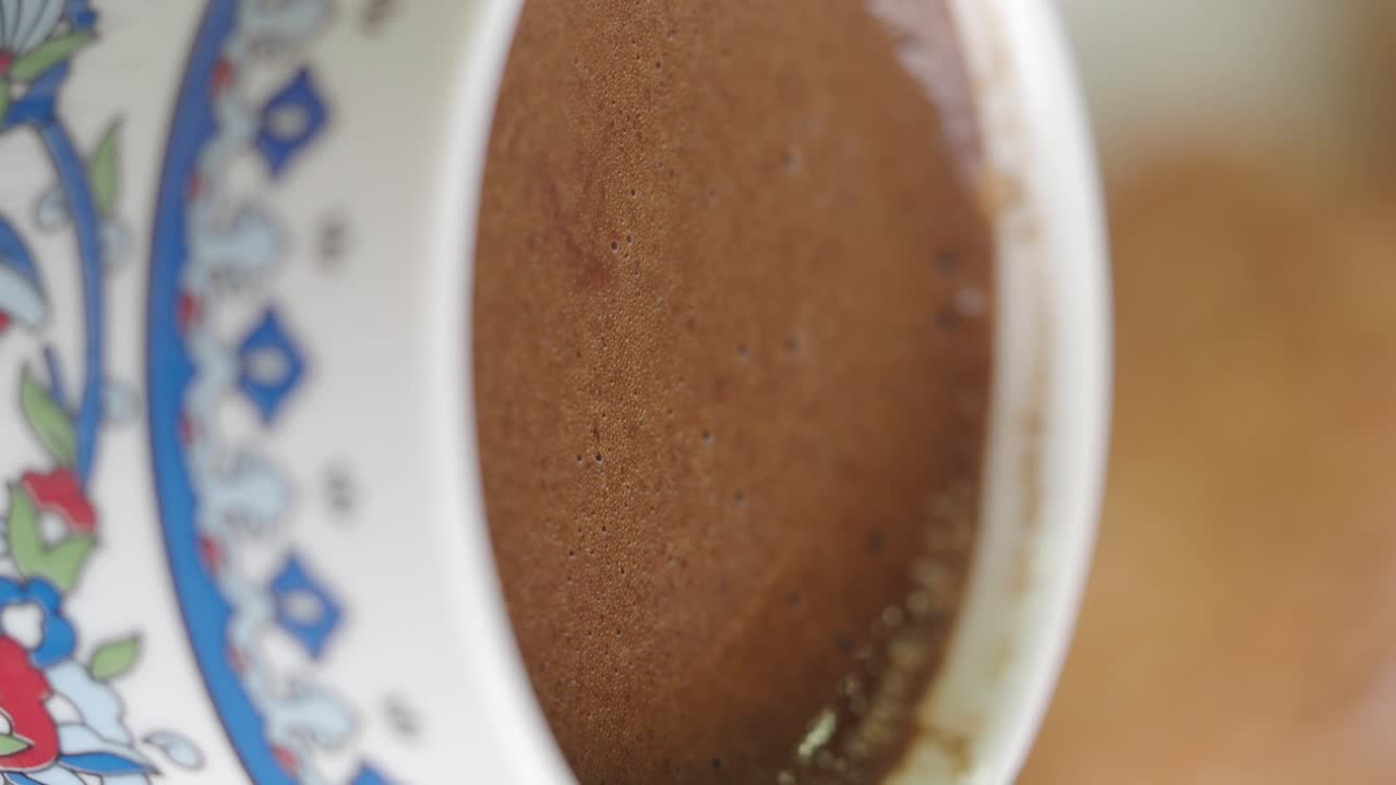 Close-up of Turkish coffee in a decorated cup