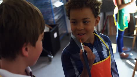 Smiling-schoolboys-panting-on-canvas